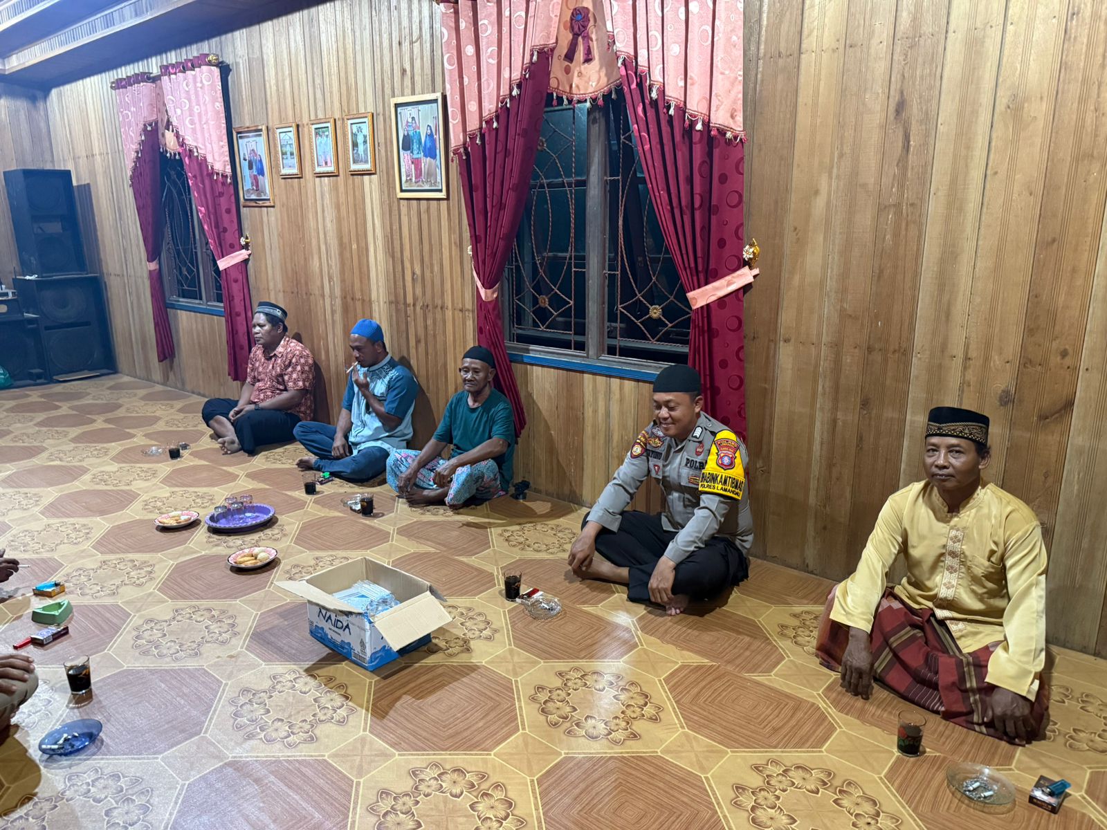 Bhabinkamtibmas Hadiri Syukuran dan Sampaikan Pesan Kamtibmas di Desa Binaan